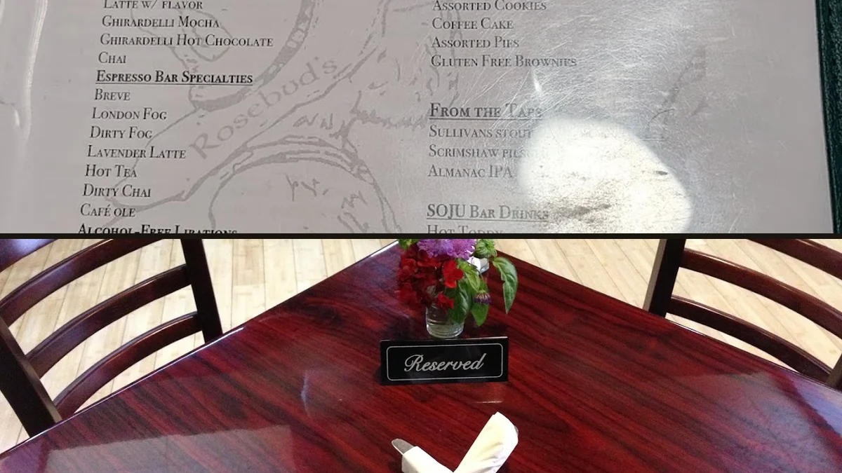 Casual tables beside a historic storefront